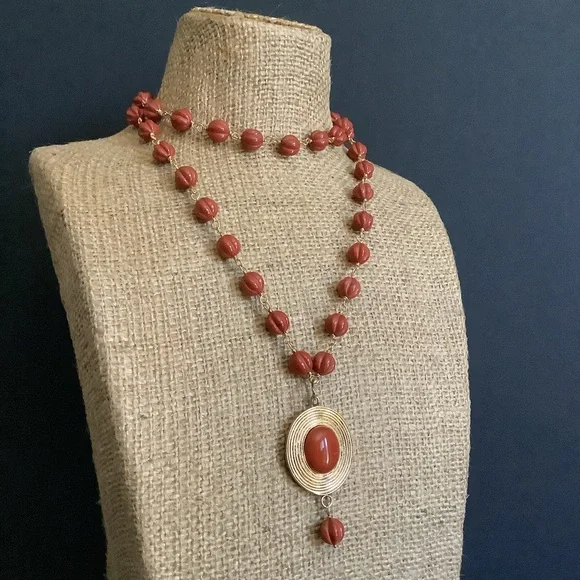 Vintage gold over sterling genuine carved jasper pendant necklace.